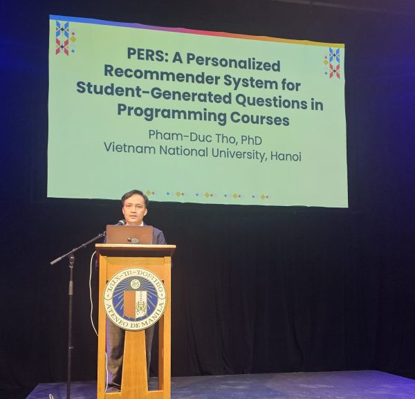 Dr. Pham Duc Tho presents his research at the conference